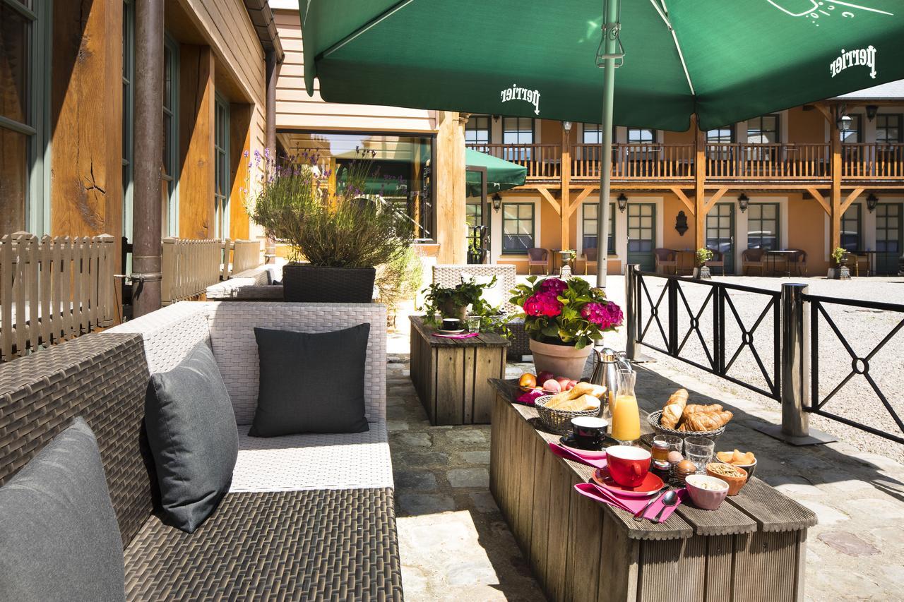 Hotel Et Spa Le Lion D'Or Pont-Évêque Exteriör bild